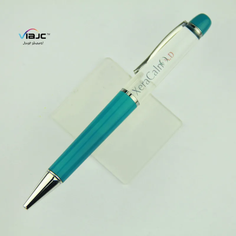 a sliding case showing a floatinc scene ink liquid floating promotional pen