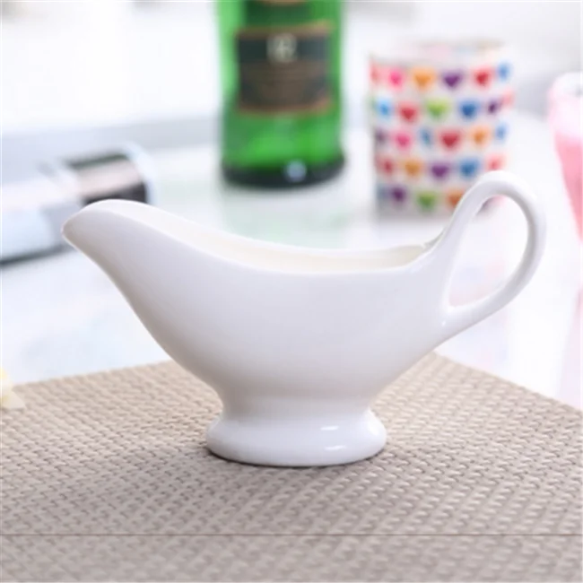 
China suppliers ceramic creamer pot,gravy boat,White Honeycomb Gravy Boat For Sauce Service 