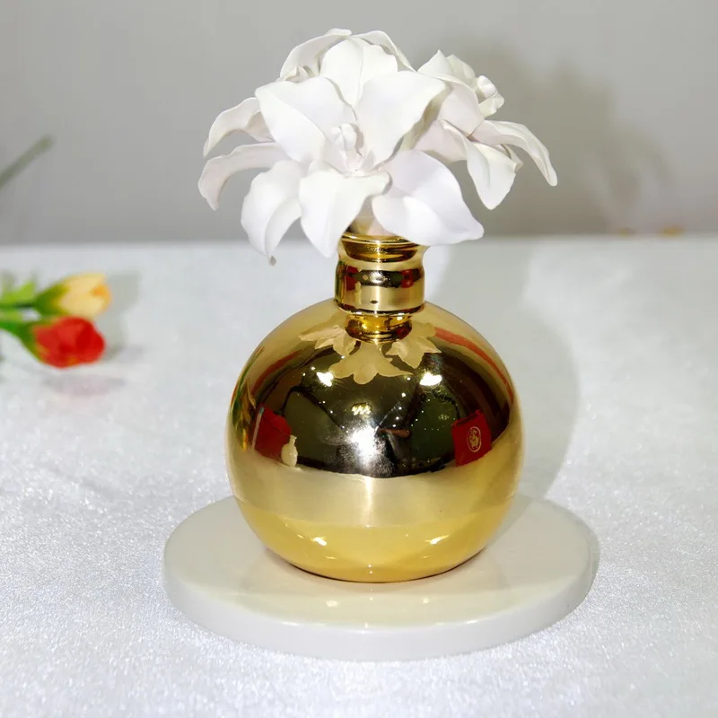 
White ceramic round bottle nebulizer essential oil diffuser 