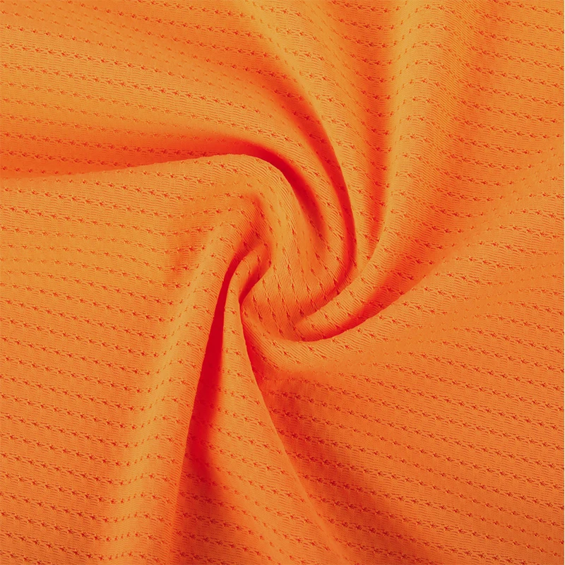 Wholesale 80 nylon 20 spandex orange soft 4 way stretch close hole lace mesh fabric for garment sportswear