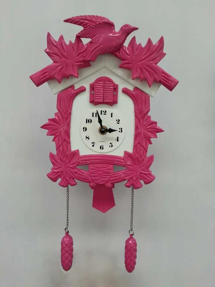 Plastic cuckoo clock with bird sound music