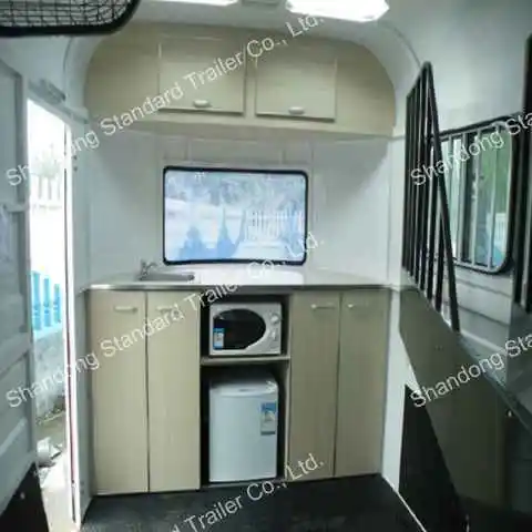 2 horse angle load trailer with kitchenette bunk beds inside