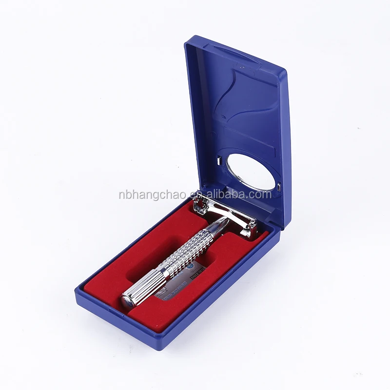 Twist to open butterfly style safety razor