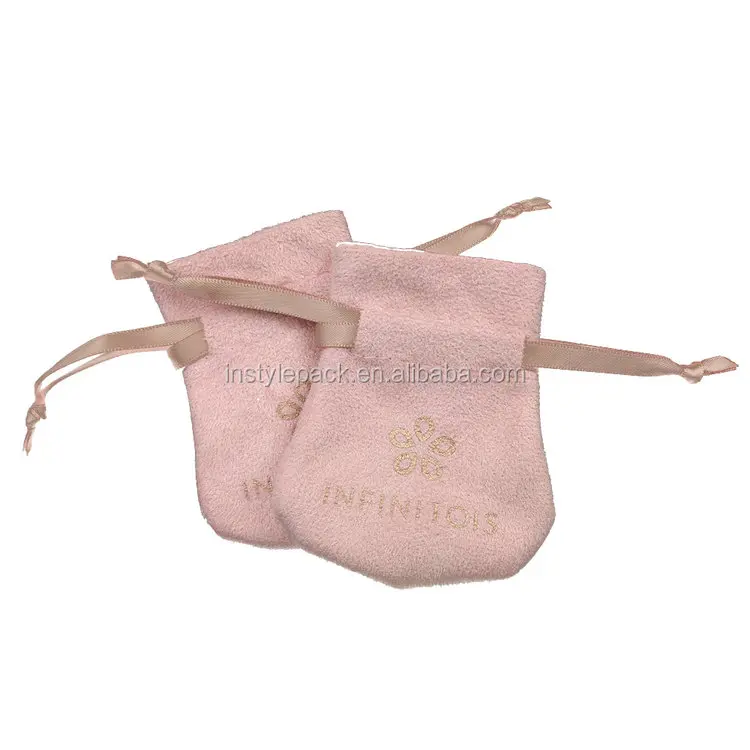 small pink velvet jewelry pouch with tassel drawstring