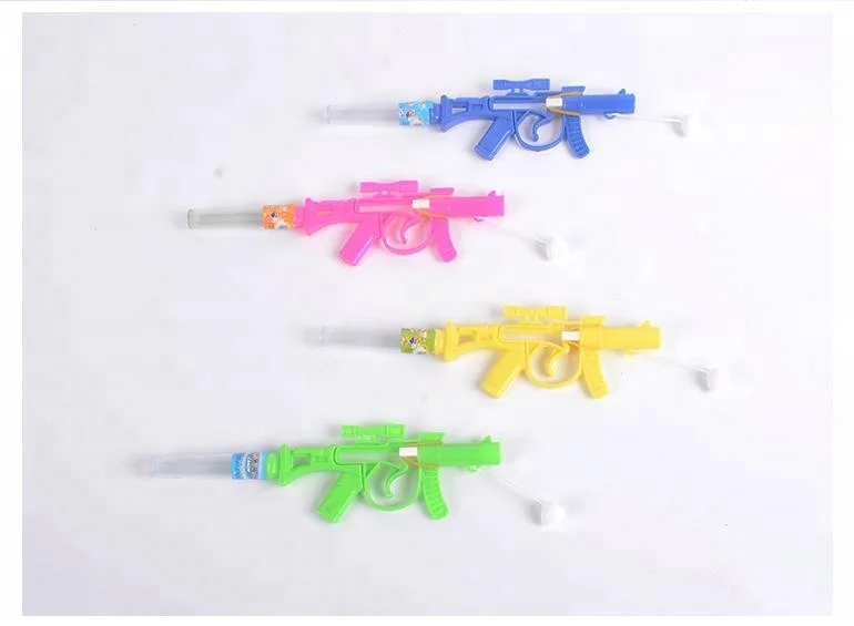 shooting game plastic mini rubber band missile toy candy gun for kids