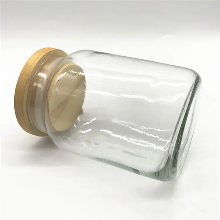 
Food containers in the kitchen Glass jars with wooden covers are used for storing food 