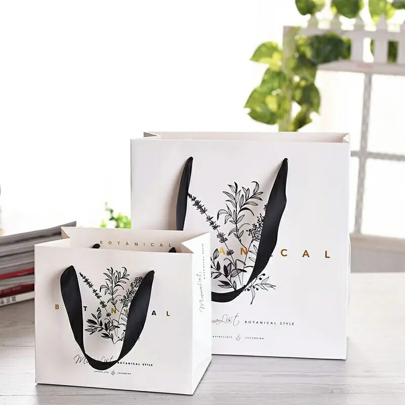 Customized Handmade Clothes Garment White Gift Bags Fancy Paper Christmas Bag With Pp Handle