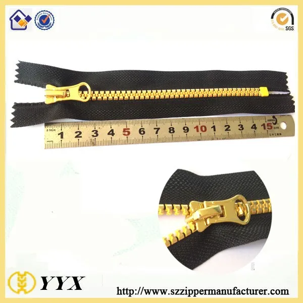 zipper factory wholesale 15 cm closed end plastic zipper gold teeth