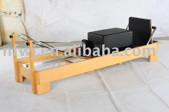 
pilates reformer with the beech wood 
