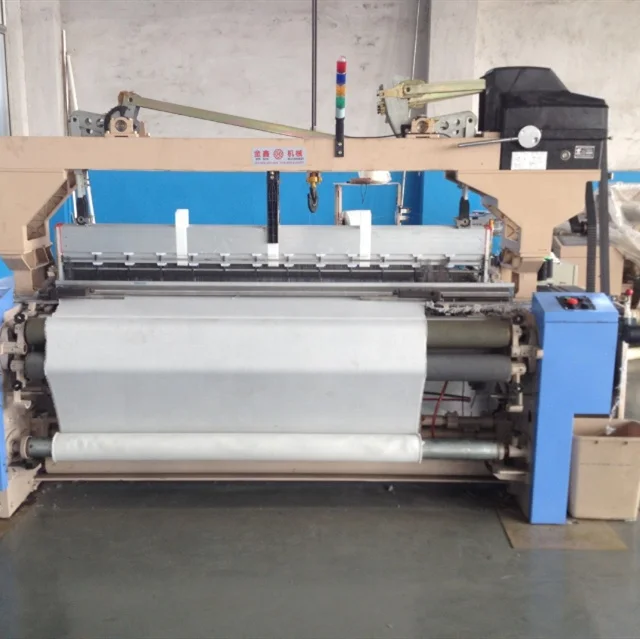 Textile weaving machine high speed air jet loom
