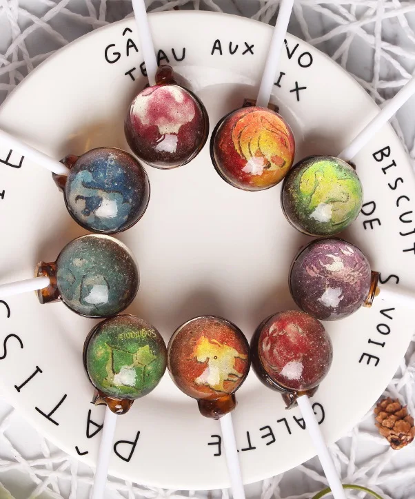 Изготовленные на заказ леденцы с 12 планетами