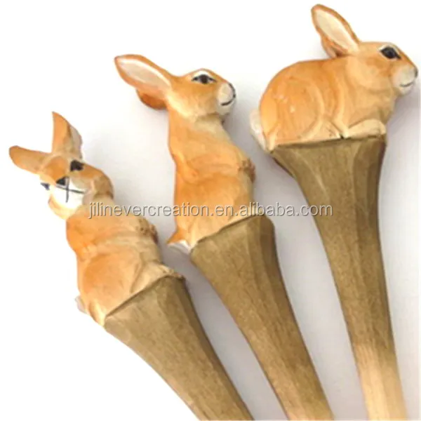 hand carving animal shape wood rabbit pen
