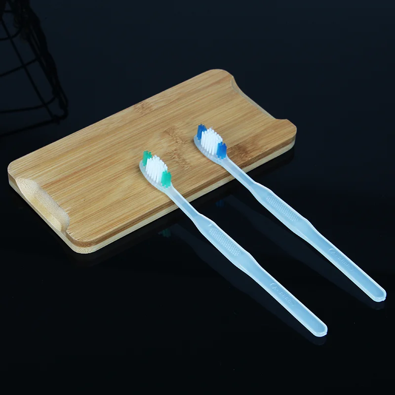 2022 Disposable toothbrush cheap for hotel travel wholesale custom factory customizable packaging logo