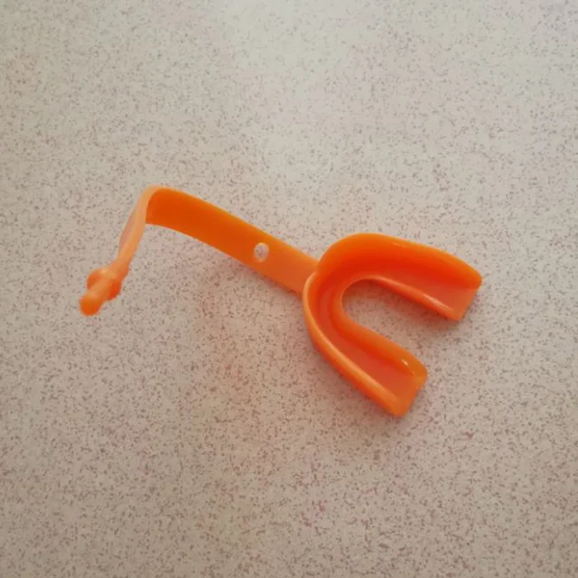 Strap mouth guard/gum shields for all contact sports