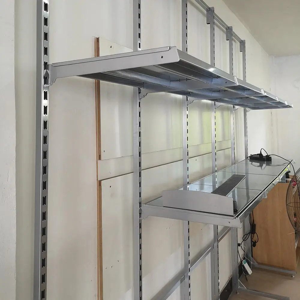 wall mounted display clothes shelving in supermarket wall system to assemble with shelves and faceouts