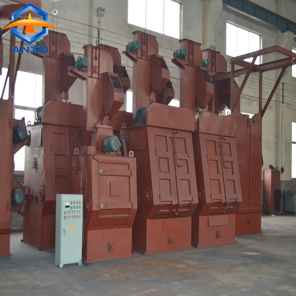 Drum type shot blaster with belt conveyor