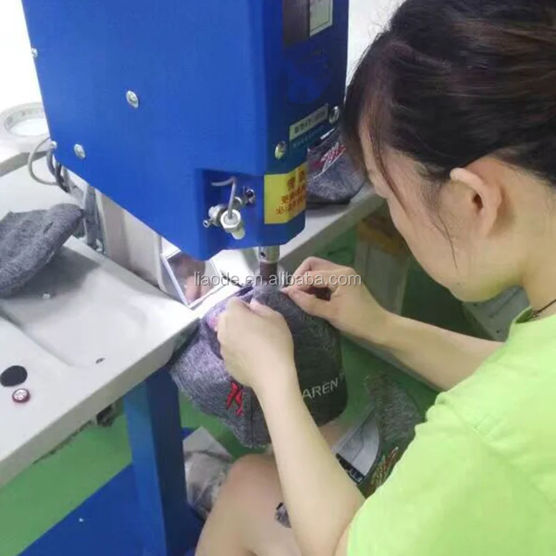 
LA-9-4M Semi-auto baseball cap fabric button attaching machine 