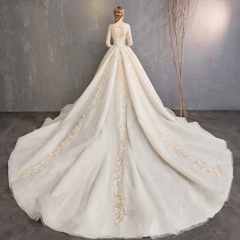 Wholesale flower lace bridal dress online hot sale elegant floor length long sleeve wedding dress