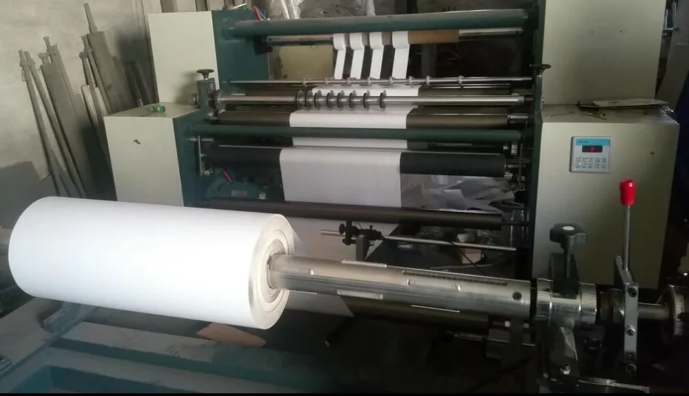 Easy operate plastic film slitting and rewinding machine