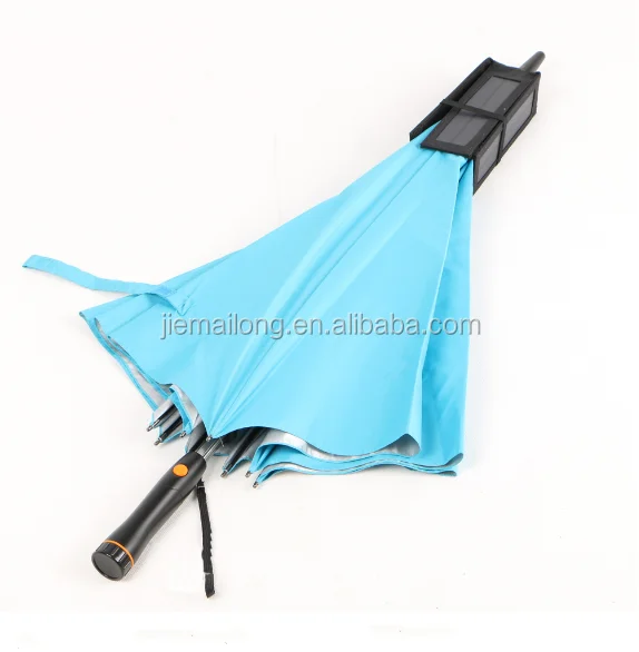 solar energy fan umbrella installed with an electric fan can shade a person from the sun or rain