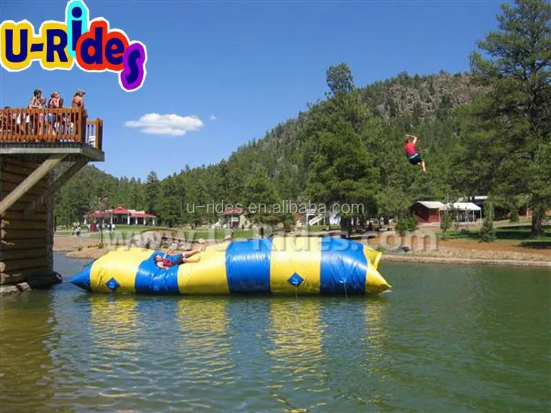 Custom lake water game 10 meter long air sealed water jumping pillow blob inflatable water catapult blob for kids and adult