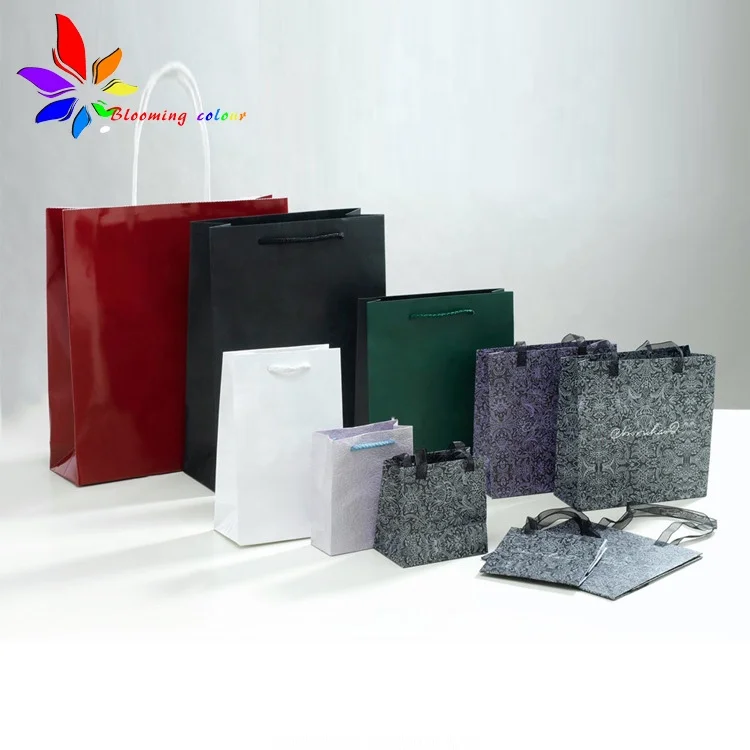 China Supplier Factory biodegradable black kraft packaging paper bag custom with handle and logo