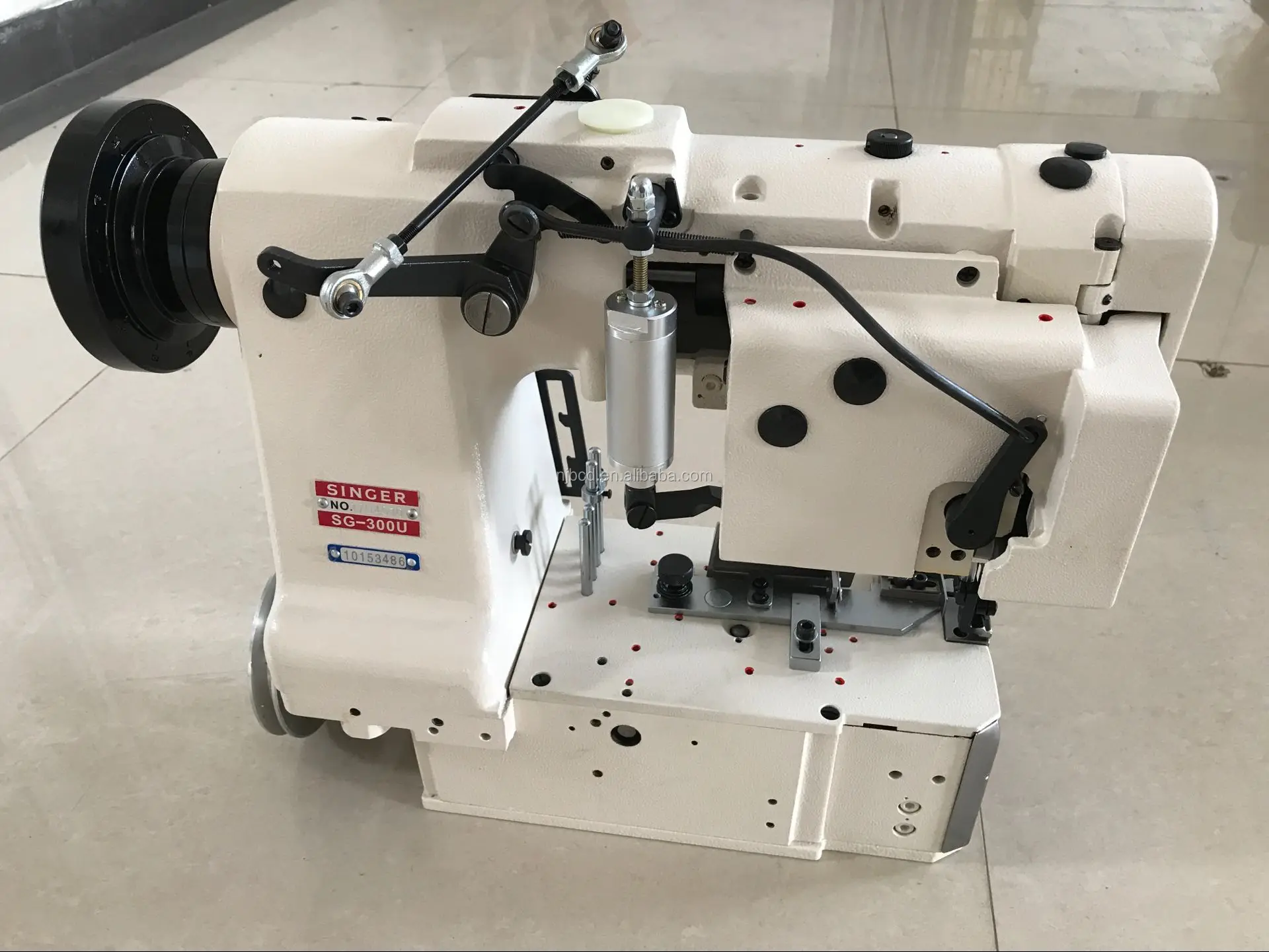 Mattress tape laying machine for mattress machine