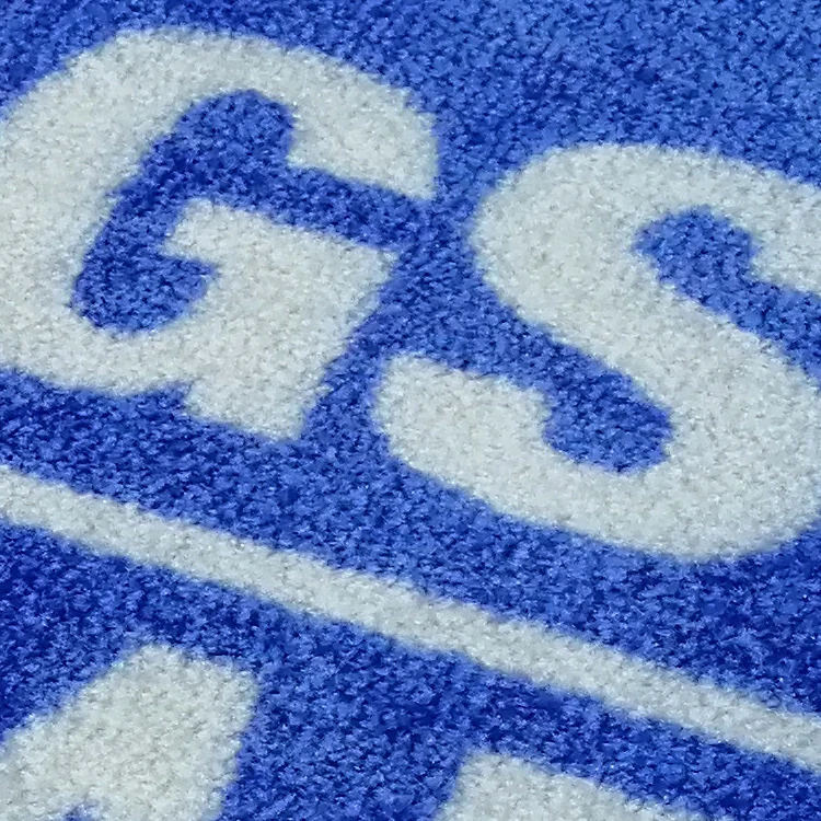 Commercial outdoor rubber backed carpet with company logo
