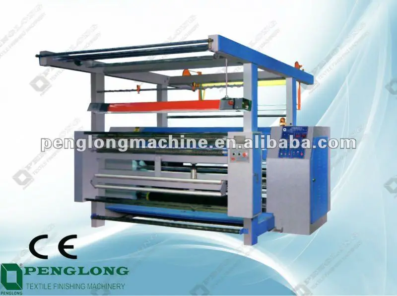 
 Машина для резки ткани, используемая на фабриках по окрашиванию  