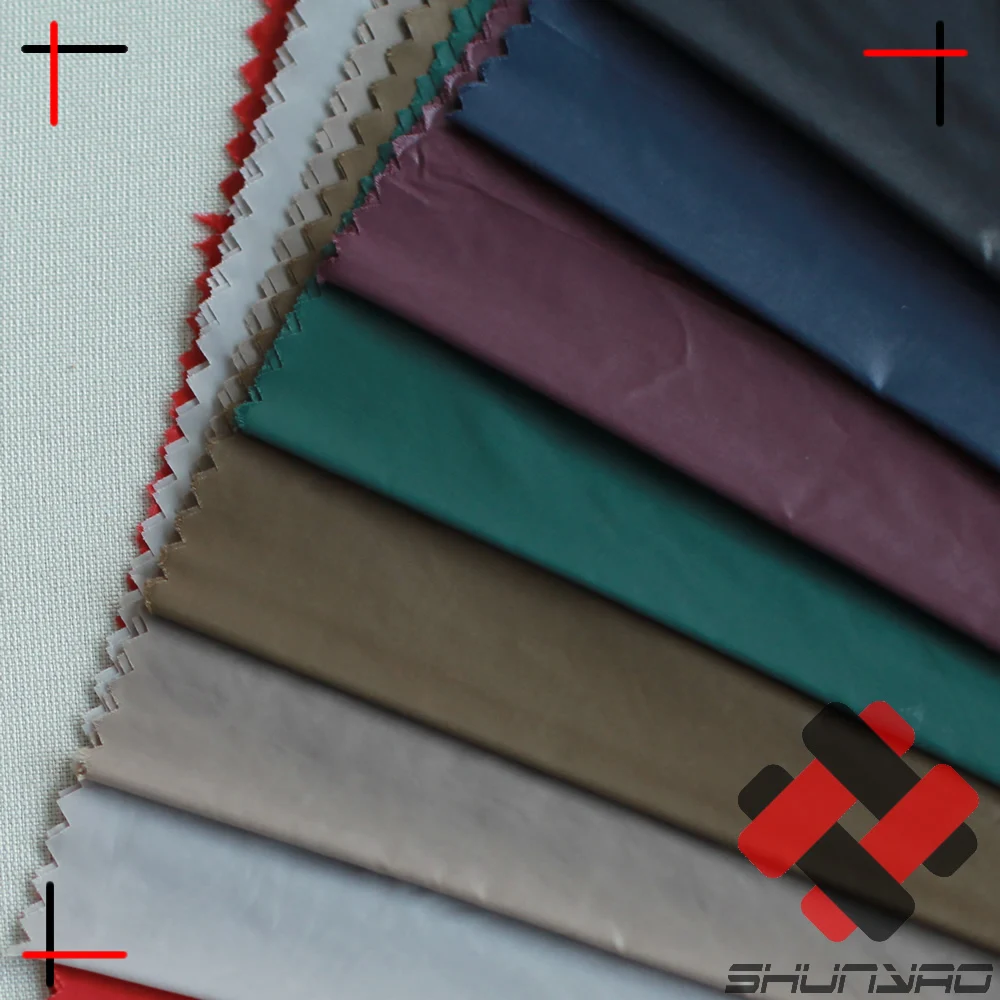 
380T 20D High Density Nylon Taffeta shioze with Oil cire finish fabric Downproof for Ultra light down jacket 