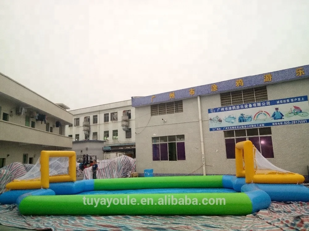 
Cheap price PVC0.9mm 6*12m inflatable football court water soccer court inflatable soccer filed 