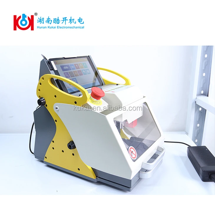 Free shipping lowest SEC-E9 automatic key cutting machine car duplicate machine car key copy machine with multi language