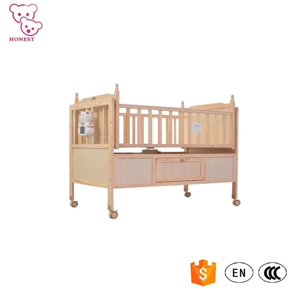 Solid wooden baby bed swinging crib for new born baby