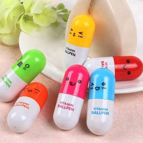 Lovely creative stationery smiling face plastic wholesale novelty pill ballpoint cute pen for gift