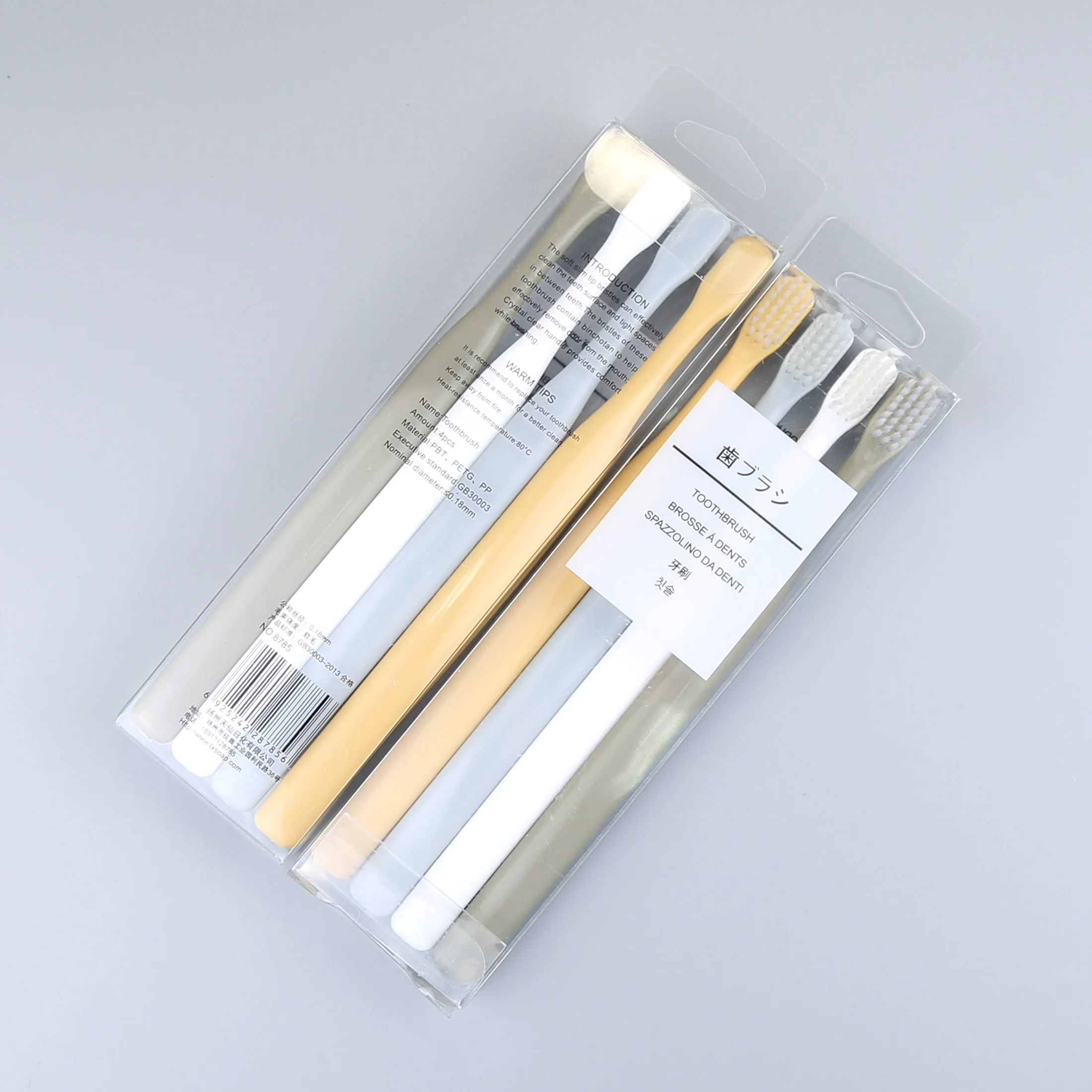 popular design small head toothbrush with super soft bristles in PVC transparent box package.