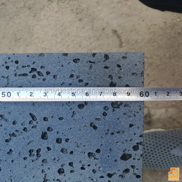 
China Hainan black lava volcanic rock stone tile price 