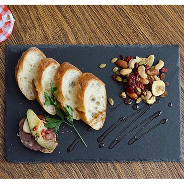 Natural Edge 30*20cm Black Wedding Decoration Rectangle Black Stone Cheese Board Plate With Eva Feet