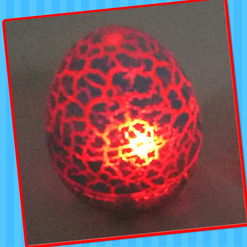 Good quality plastic dinosaur egg toy with candy China supplier of Shantou dinosaur egg with light for kids