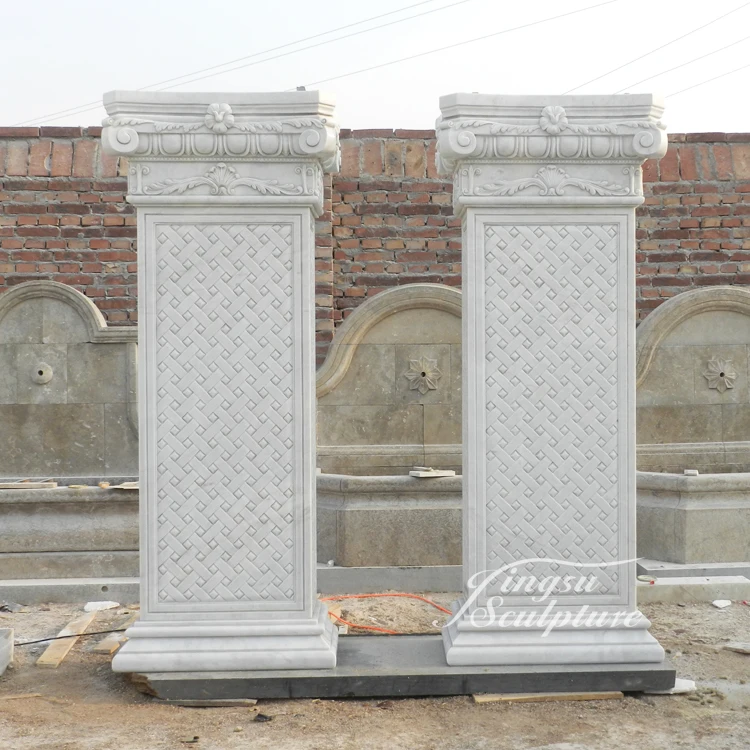 White marble carved main gate pillars design