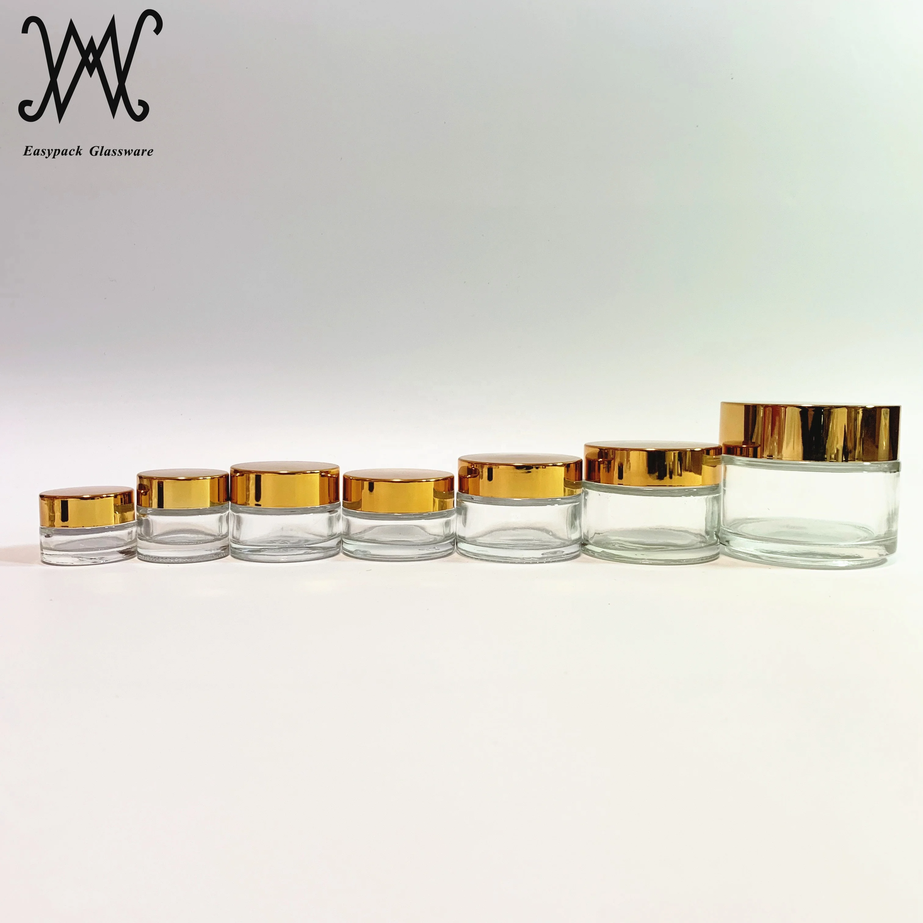 100g 100ml clear glass cosmetic packaging jar with gold metal lid for cream oil