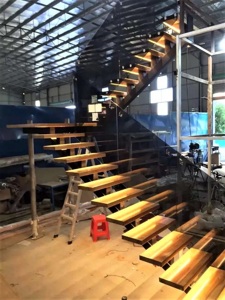 
lighted solid wood ladder staircase glass railing designs 