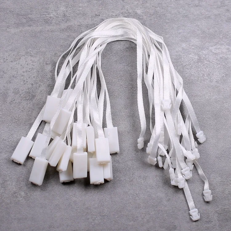 Wholesale plastic cotton string hang tag string seal cord for clothing,China jeans printed tags design hang tag nylon string