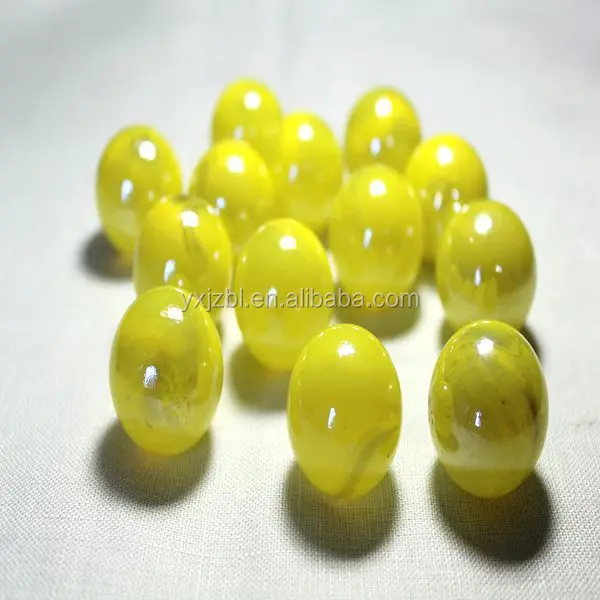 
Yellow colour transparent playing glass marbles for children 