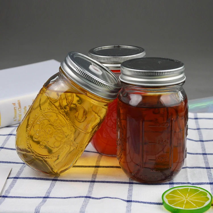 
Wholesale fully stocked large glass Mason Jar wood lids for new wholesale food jar glass bottle drink 500ml 