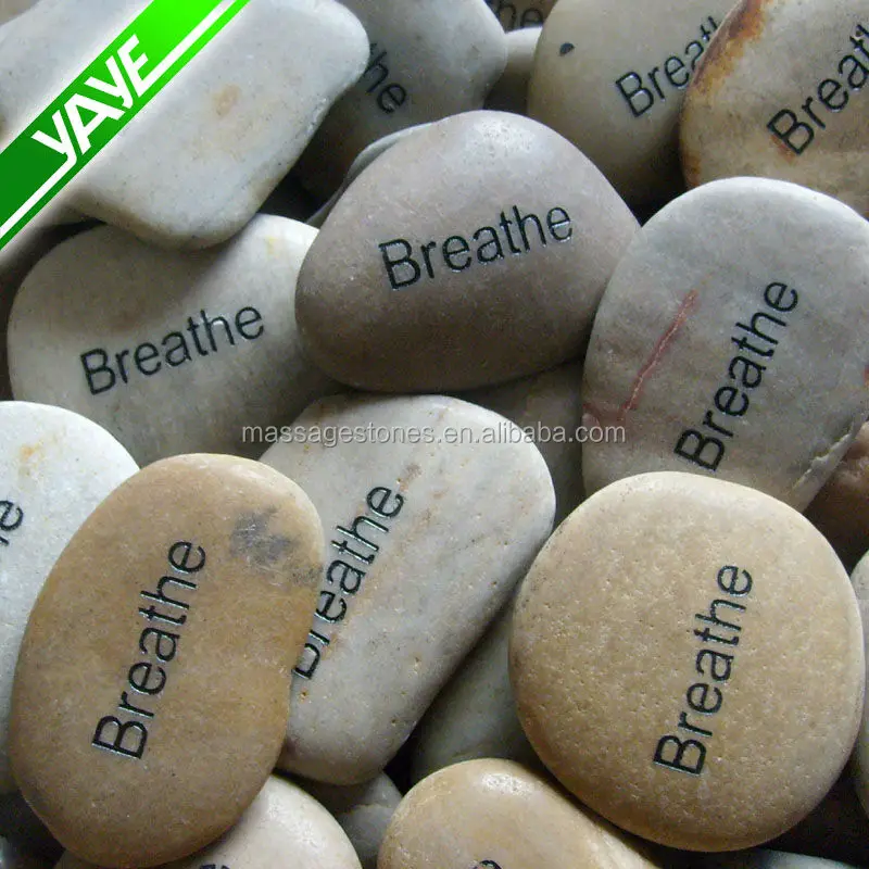 Engraved river stones etched with inspiration word,phrase, logo rock