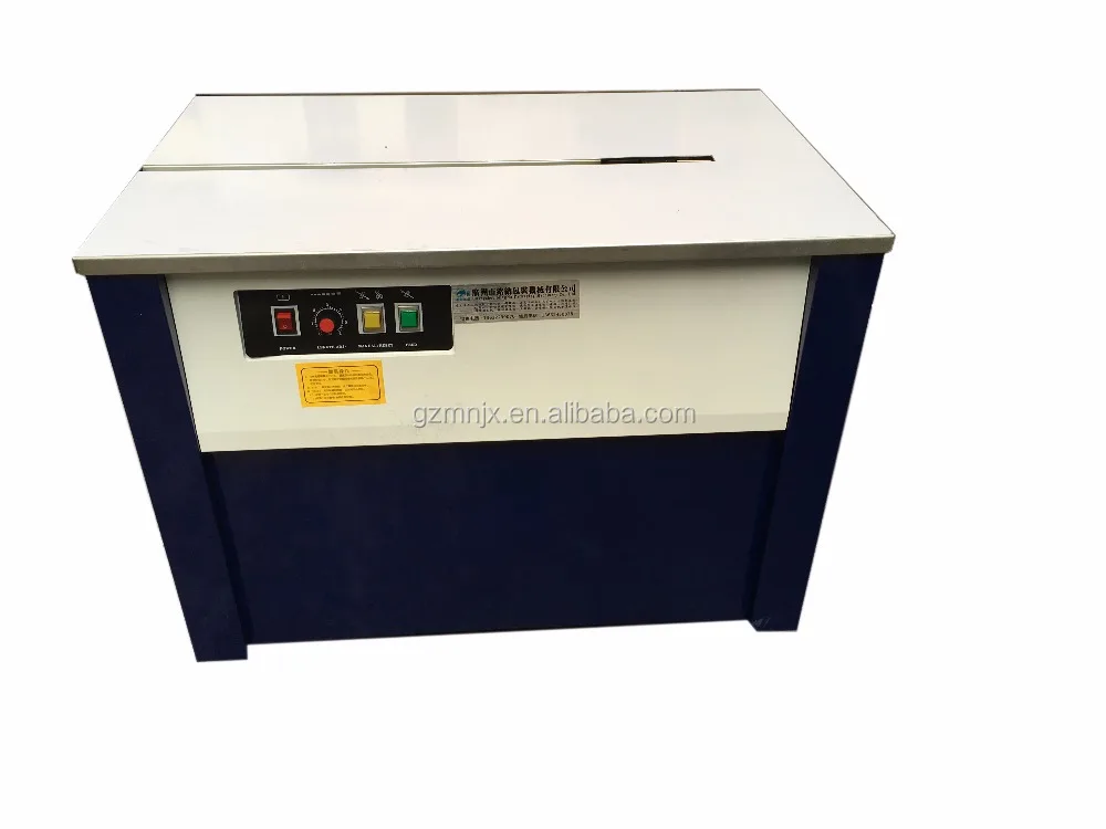 Guangzhou MingNa transpak pp packing slipper banknote carton pp strap pressure type plasticpet strap machine