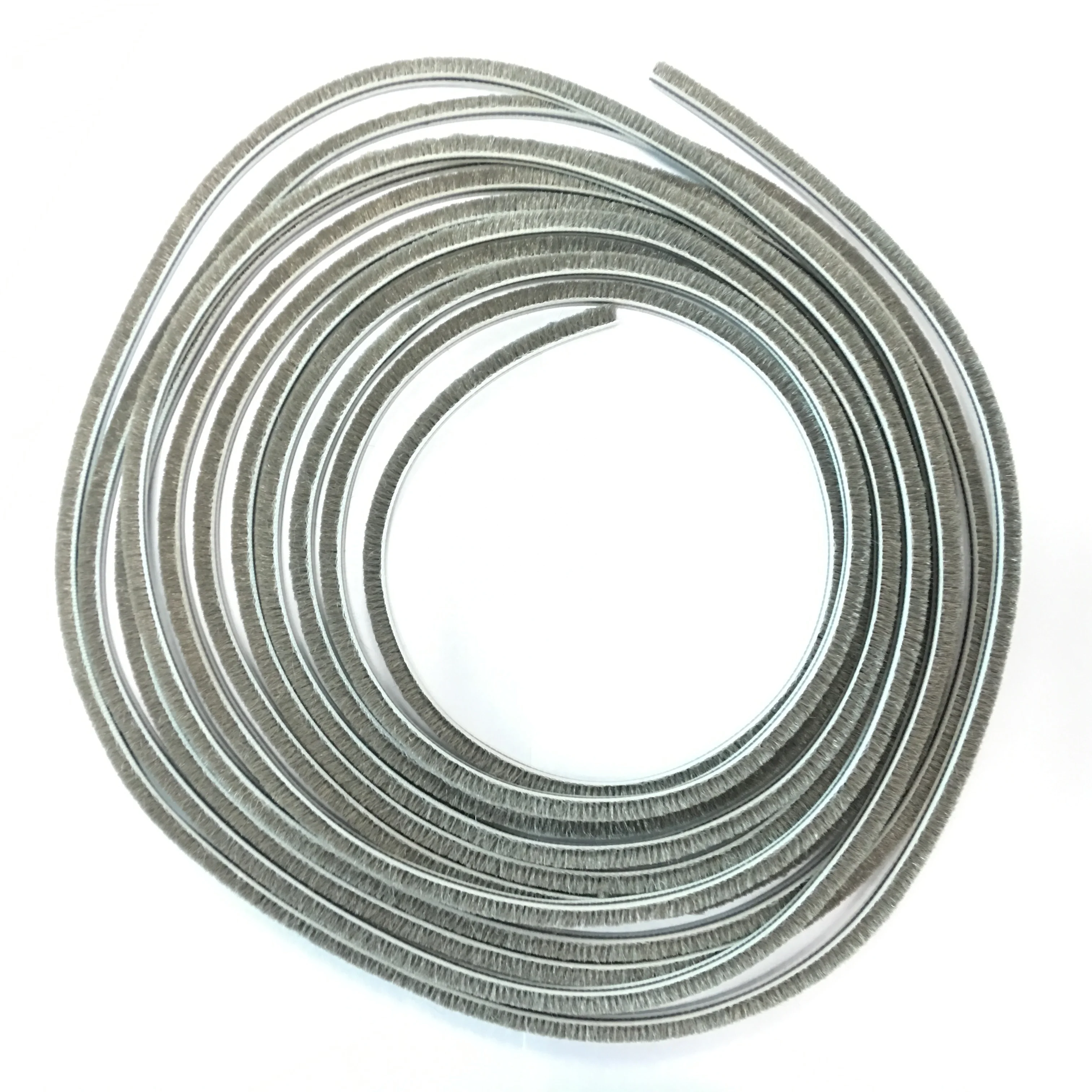 Wool pile weather seal strip door