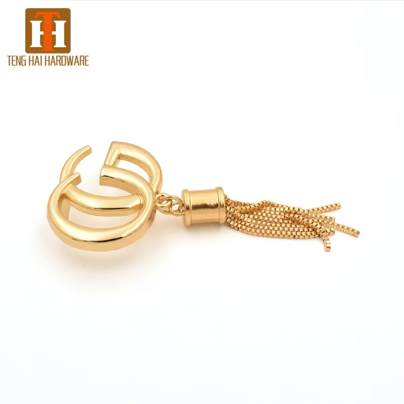 Hot sales hanging logo fashion handbag accessories metal tassels for making purses