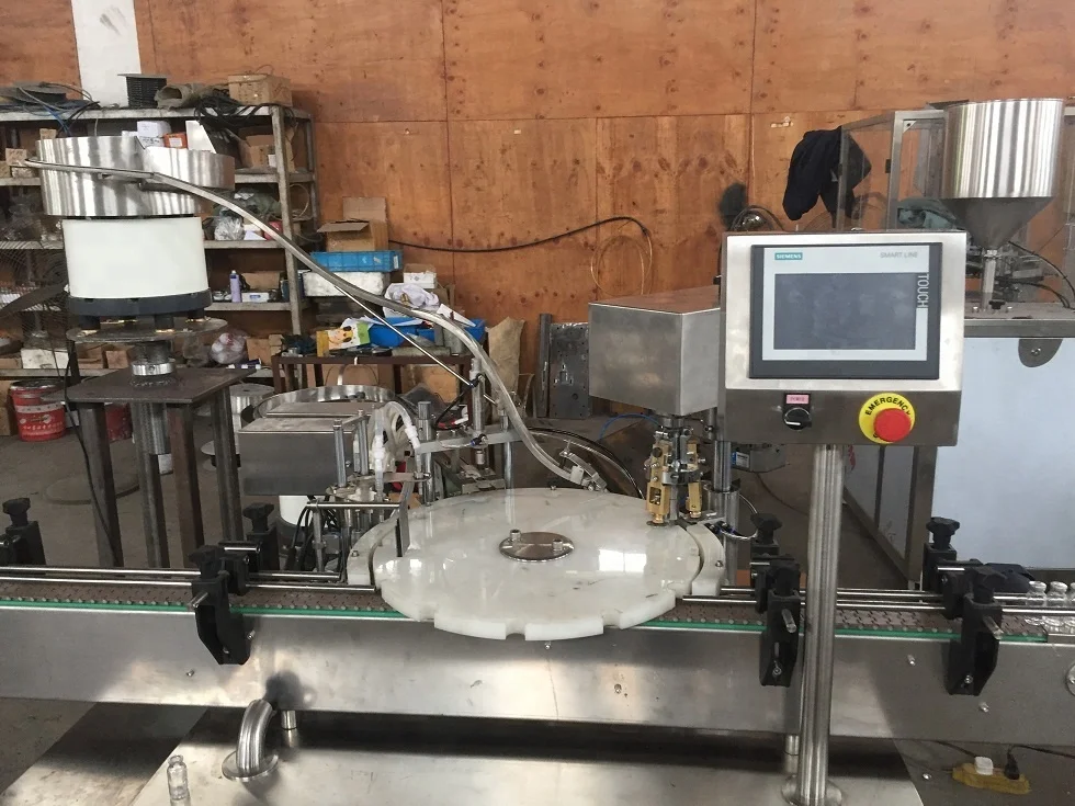 
China end manufacturer top quality full automatic filling glass bottle oral vial capping machine 