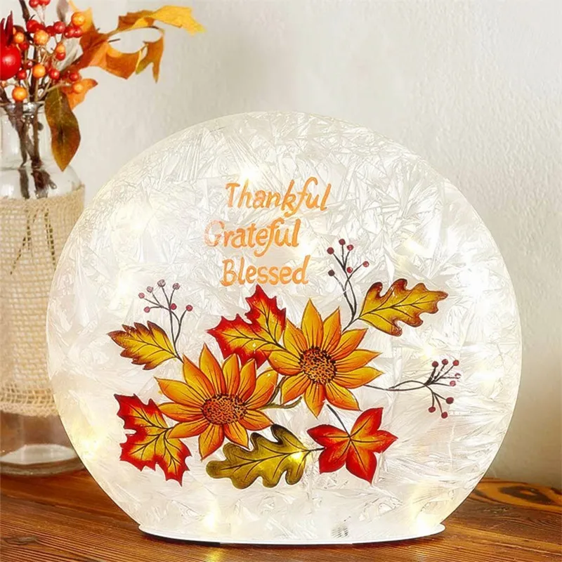 Hand drawn lit glass ball accent. Christmas decoration crack ball